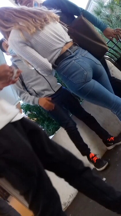 Blonde with a tight ass in blue jeans attracting attention - Tight ...