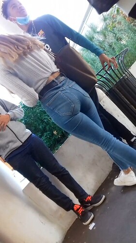 Blonde with a tight ass in blue jeans attracting attention - Tight ...
