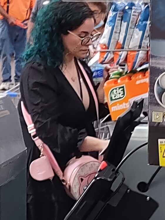 Sexy nerdy Mexican Tamale border in Walmart, Serious cleavage and