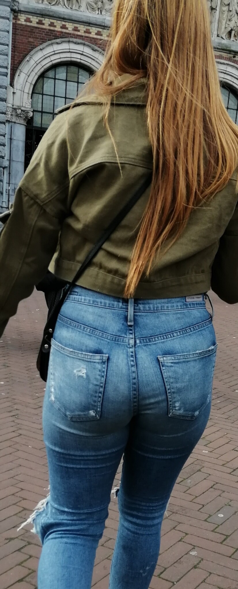 Blonde girl with a good booty in jeans