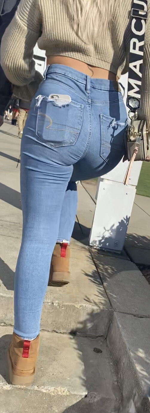 Thick blonde hikes up her tight blue jeans! - Tight Jeans - Forum